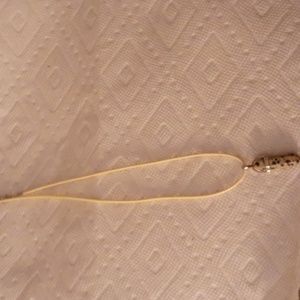 Spotted bullet pendant